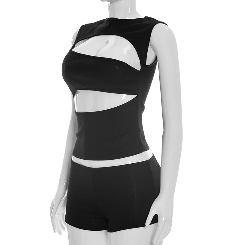 Black ribbed knit cut out tank top and shorts set featuring bold white cut-out panels on a sleeveless black top and matching black shorts.