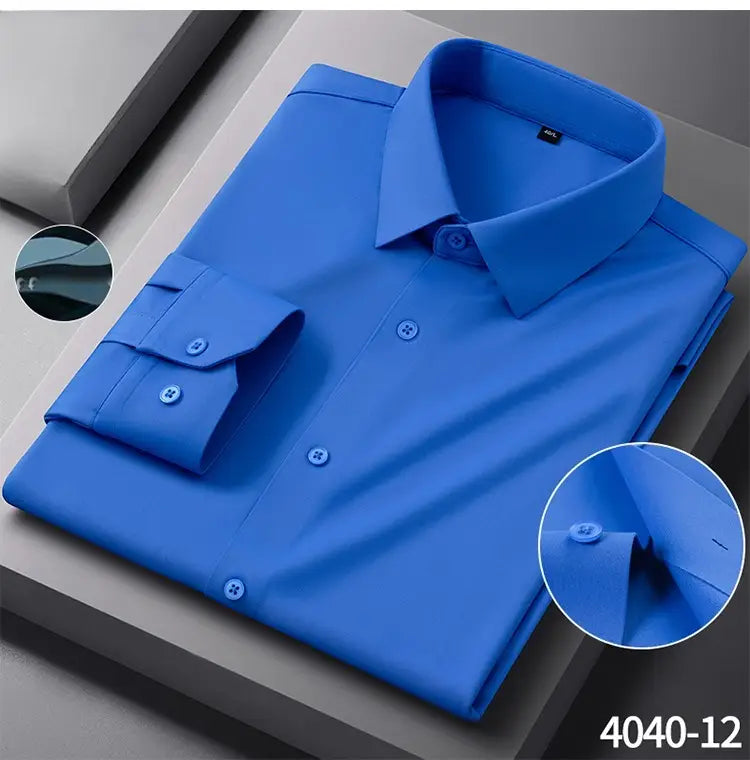 A crisp royal blue men’s slim fit nylon formal dress shirt with a classic collar and buttoned cuffs featuring matching buttons.