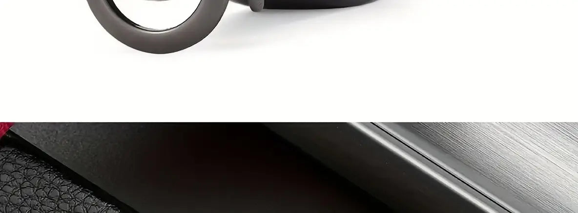Black leather mens automatic buckle belt with a sleek metallic buckle and textured surface.