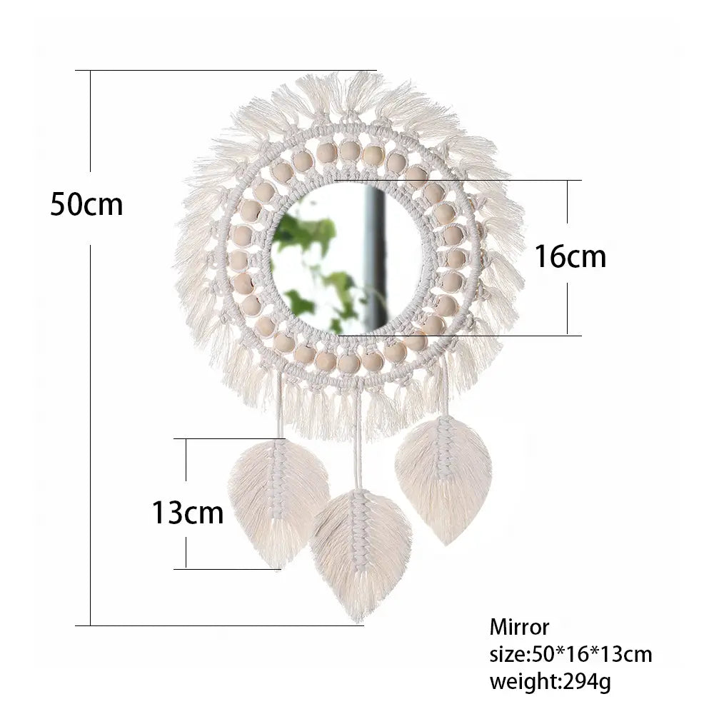White round macrame wall mirror with a circular frame adorned with beads and tassels featuring three feather-shaped hanging decorative mirrors for boho wall decor.