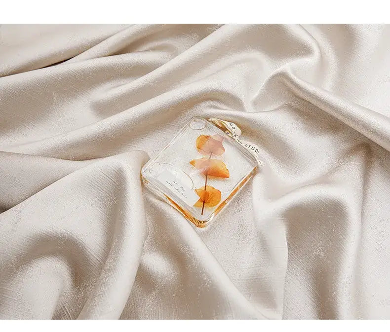 clear phone case with preserved orange and pink ginkgo leaves embedded in resin and minimalist design paired with living room blackout drapes para la sala featuring tassel tieback beads