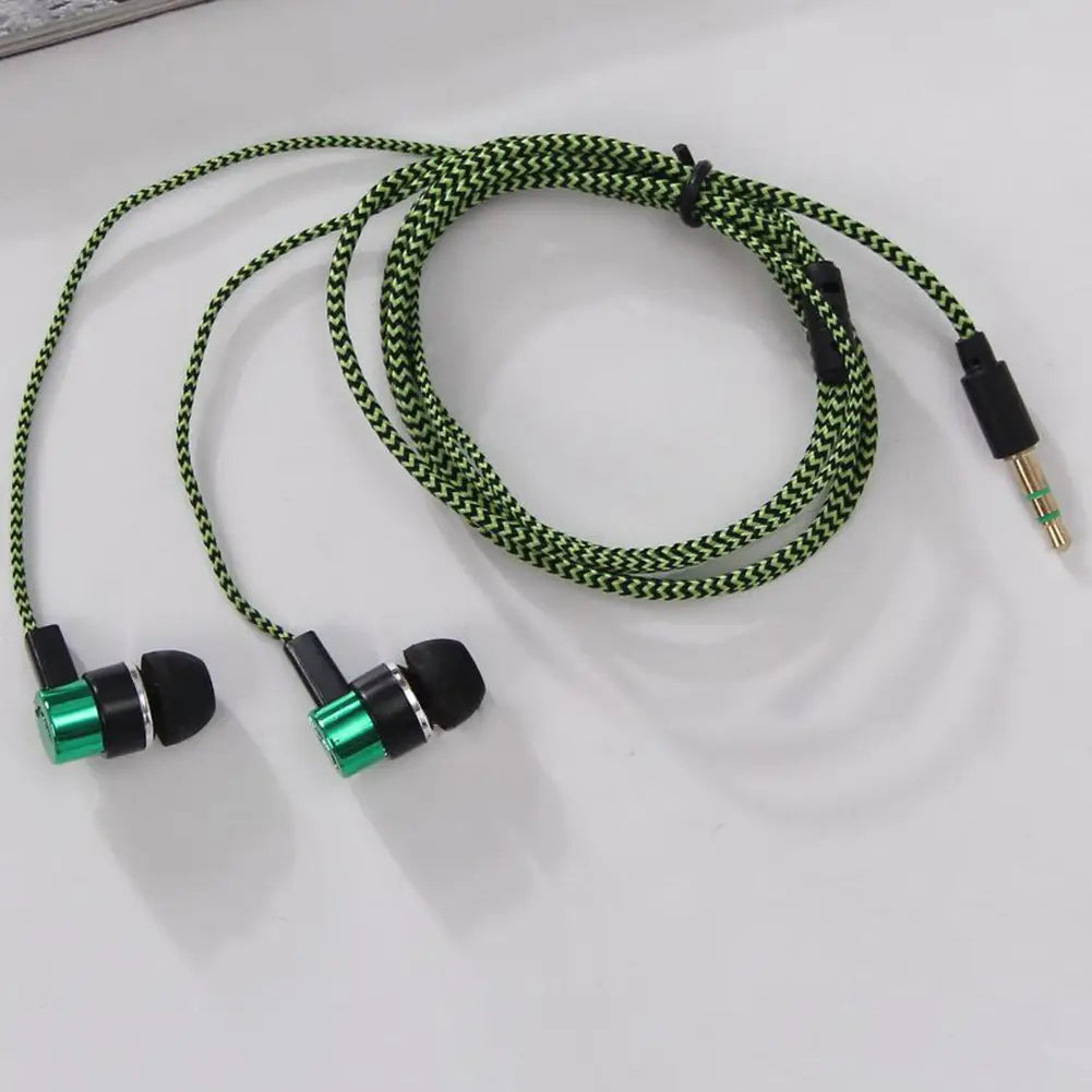 Green and black woven 3.5mm wired in-ear bass stereo earphones with metallic green accents on the earbud housings designed for high-quality audio playback.