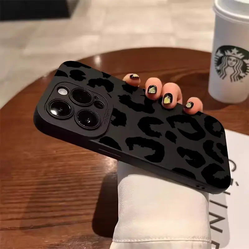 Black leopard-print matte finished phone case designed to protect the back of an iPhone model.
