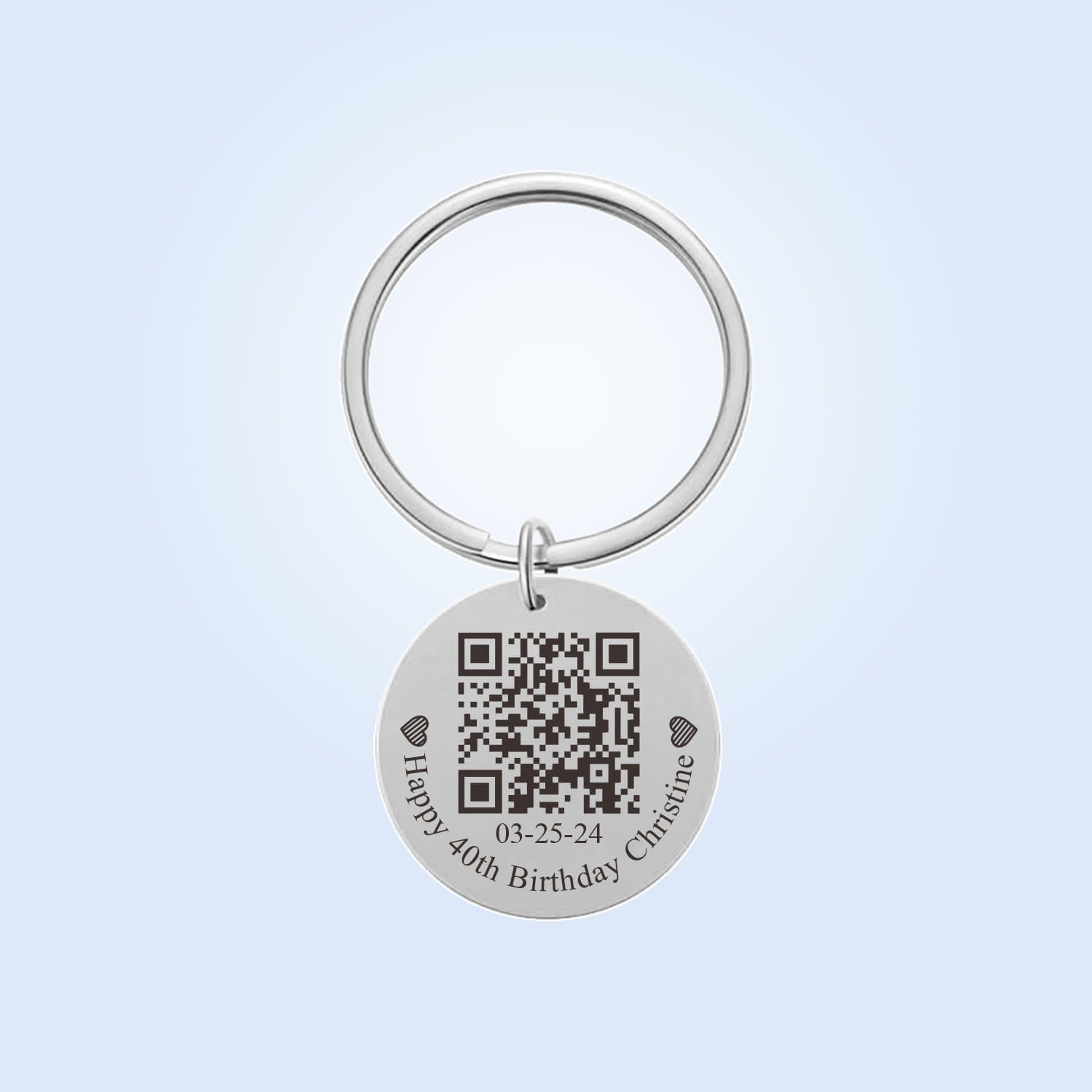 Silver circular personalized fingerprint qr code keychain gift with engraved text happy 40th birthday Christine and date 03-25-24 flanked by two heart symbols.