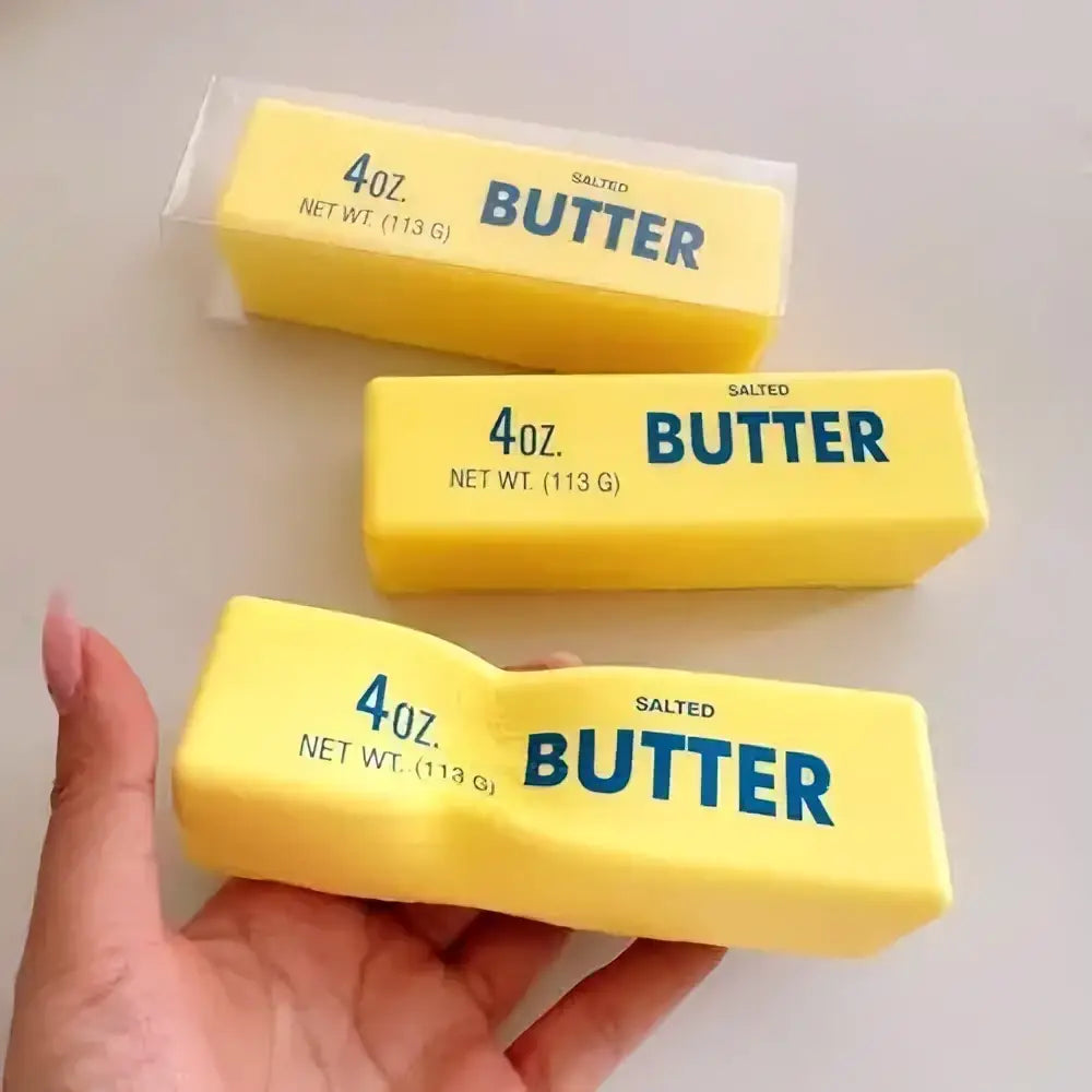 Yellow salted butter sticks soft wet squeeze stress relief noodle squishy toy labeled 4oz each for decompression