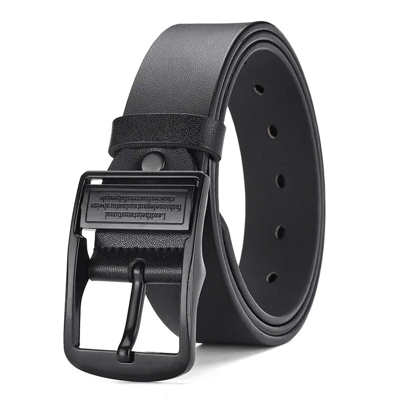 Black leather belt with a matte black metal buckle featuring engraved text designed for casual jeans.