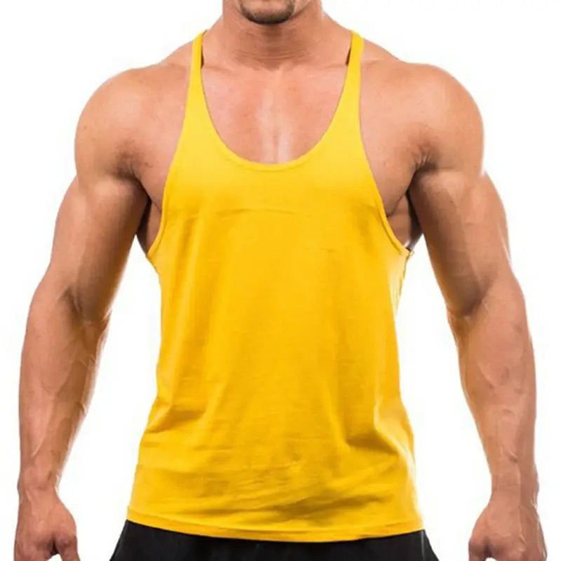 Camiseta sin mangas de algodón para gimnasio de hombre de tipo muscle color amarillo brillante, sin mangas y con un diseño sencillo de color uniforme.