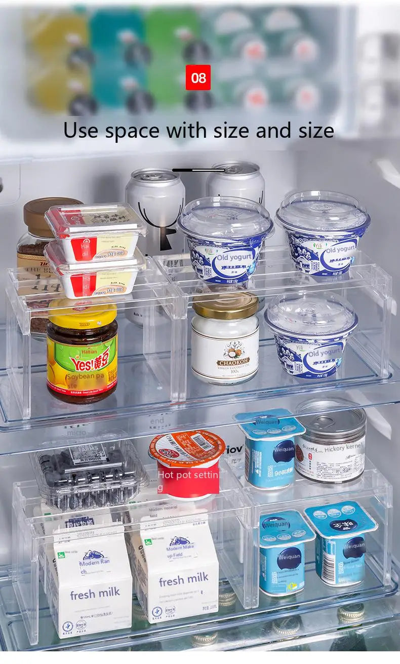 Clear expandable cabinet organizer and spice rack made of clear plastic with transparent compartments holding various dairy products and canned goods.