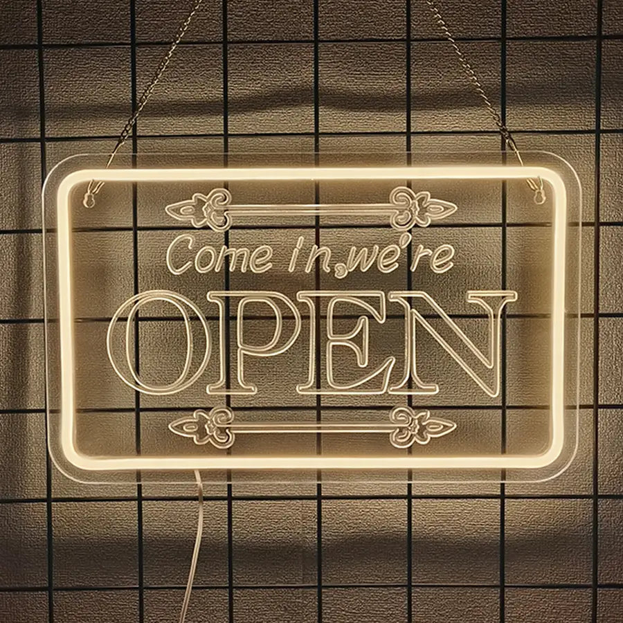 Enseigne murale décorative en néon rectangulaire à LED, à lueur chaleureuse, alimentée par USB, portant les mots « Entrez, nous sommes ouverts », illuminés dans une écriture élégante et des lettres en caractères gras
