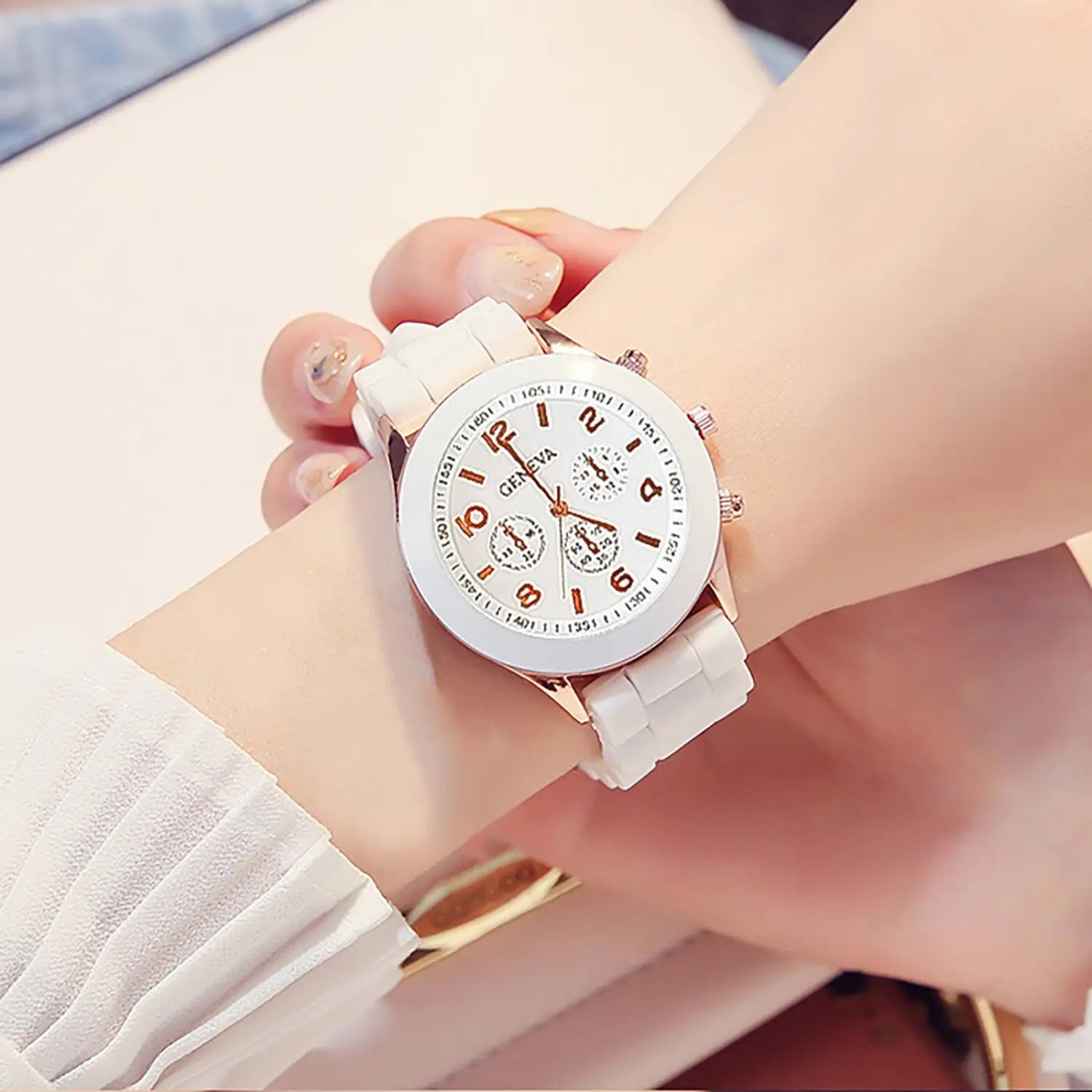 White ceramic women silicone quartz watch with rose gold accents and a chronograph dial for fashion use