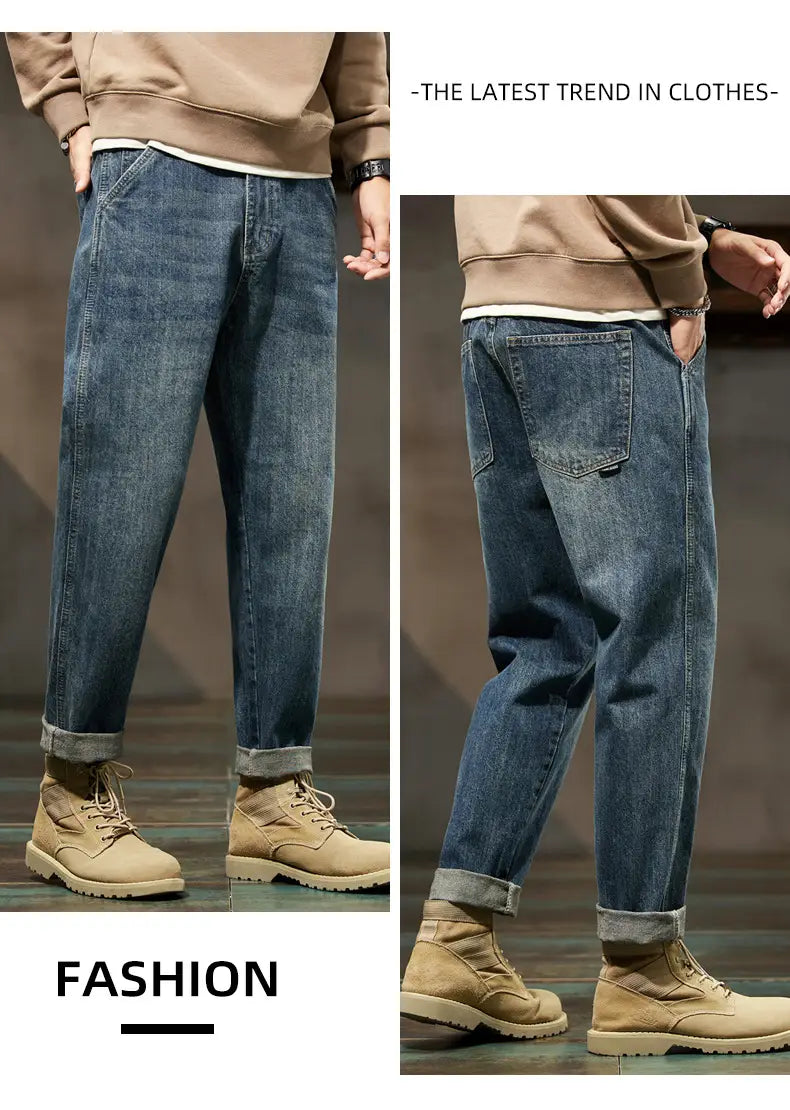 Men loose denim harem jeans in blue with relaxed fit and rolled cuffs made of denim material.