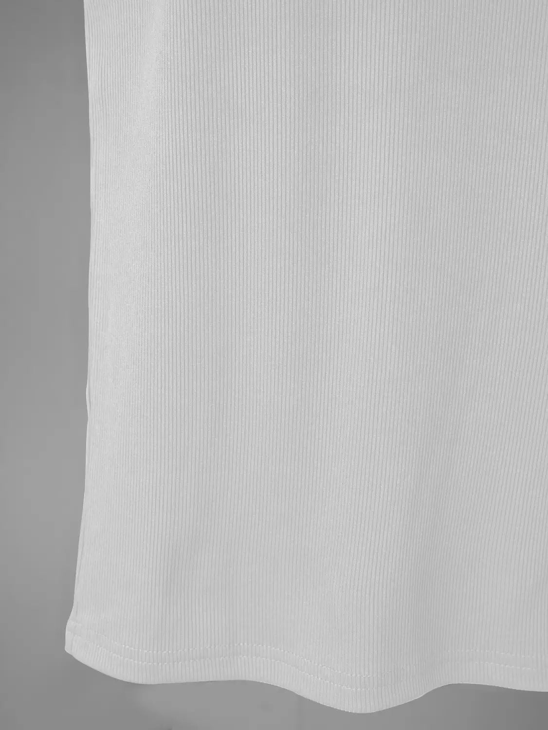Men’s ribbed cotton tank top in white featuring a square neck and soft flowing hem.
