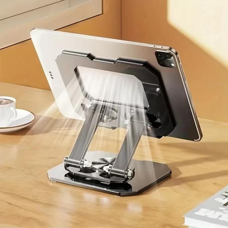 adjustable silver aluminum alloy tablet phone stand holding a black ipad with 360 rotatable feature