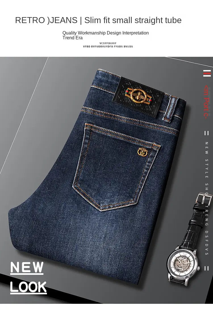 Slim fit dark blue denim jeans for men featuring slim-fit straight-leg cut with a black leather patch and gold-tone logo detailing.