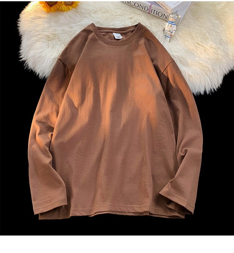 A soft muted brown oversized long sleeve blank t-shirt with a classic crew neck and relaxed fit.