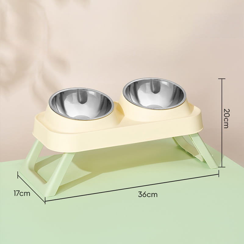Cream-colored plastic elevated pet feeder featuring two stainless steel tilt bowls for improved feeding comfort.