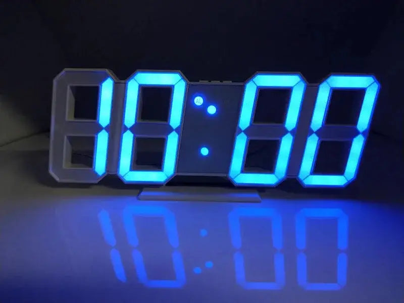 Blaue LED-Uhr-Dekoration mit modernem dreidimensionalem Design, einschließlich Leuchtnachtmodus und einstellbaren elektronischen Uhr-Einstellungen für stilvolle Verwendung in Wohnräumen