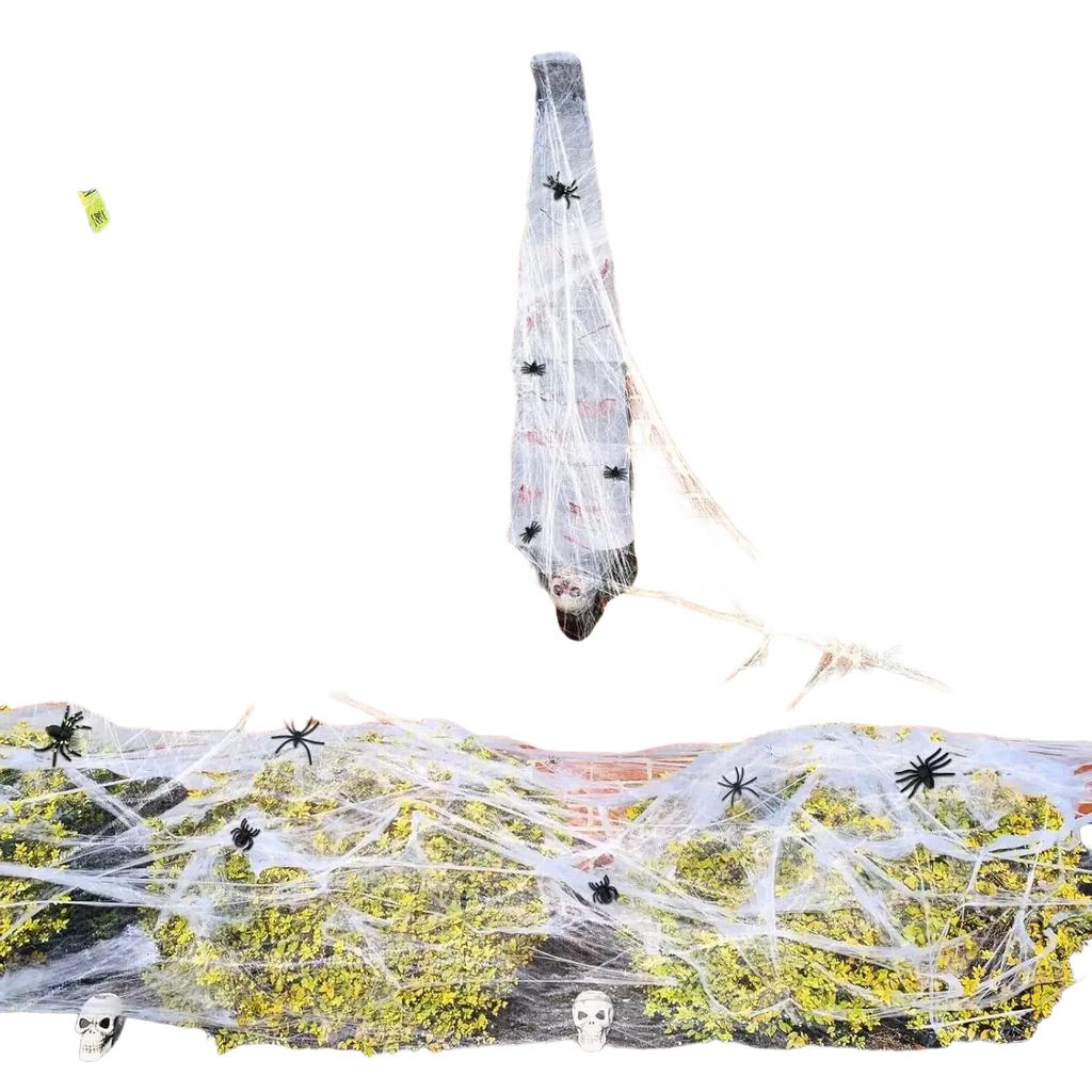 A white translucent hanging halloween decoration with black hair suspended in super stretch cobwebs for halloween party decorations