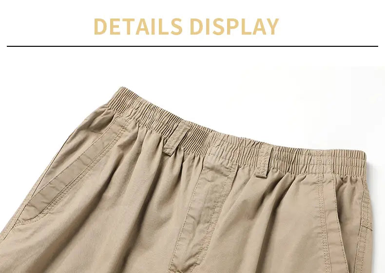 beige cotton men cargo pants with elastic waistband and side pockets featuring a relaxed fit for utility use