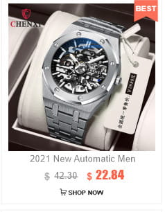 Megir Military Quartz Watch with brown leather strap featuring a silver-toned skeletonized automatic case with exposed mechanical movement and blue-accented dial presented in an elegant box.