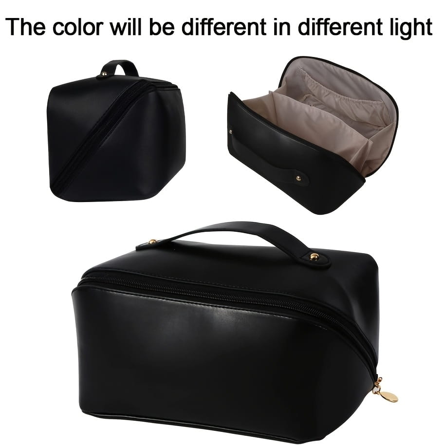 Schwarze Kunstleder-Make-up-Tasche mit Tragegriff oben und goldfarbenem Reißverschluss-Zieher für die beige Stoff-Reise-Make-up-Tasche und den Kosmetikorganizer.