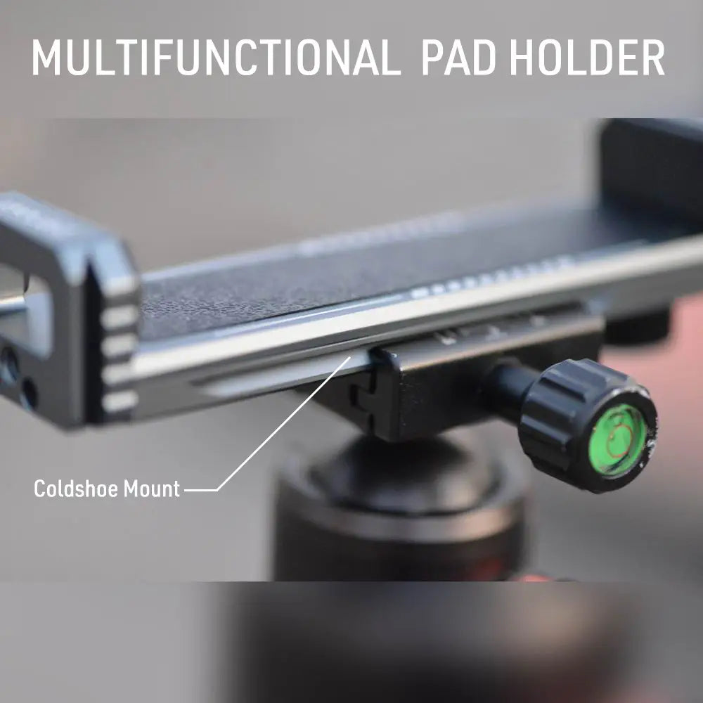 Black aluminum tripod mount adapter tablet clamp with multifunctional pad holder, textured grip surface, coldshoe mount, and green bubble level.