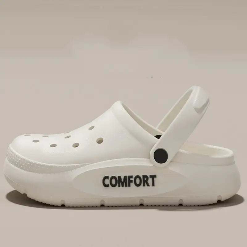 Unisex-Dicke-Plattform-Eva-Clog-Sandale in Weiß mit schwarzem Komfort-Schriftzug auf der Seite und einer strukturierten Gummisohle.