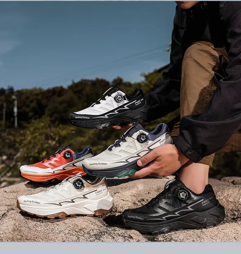 Men hiking shoes waterproof lightweight trekking sneakers in black and white with a distinctive lightning bolt design durable rubber soles and adjustable circular lacing systems.
