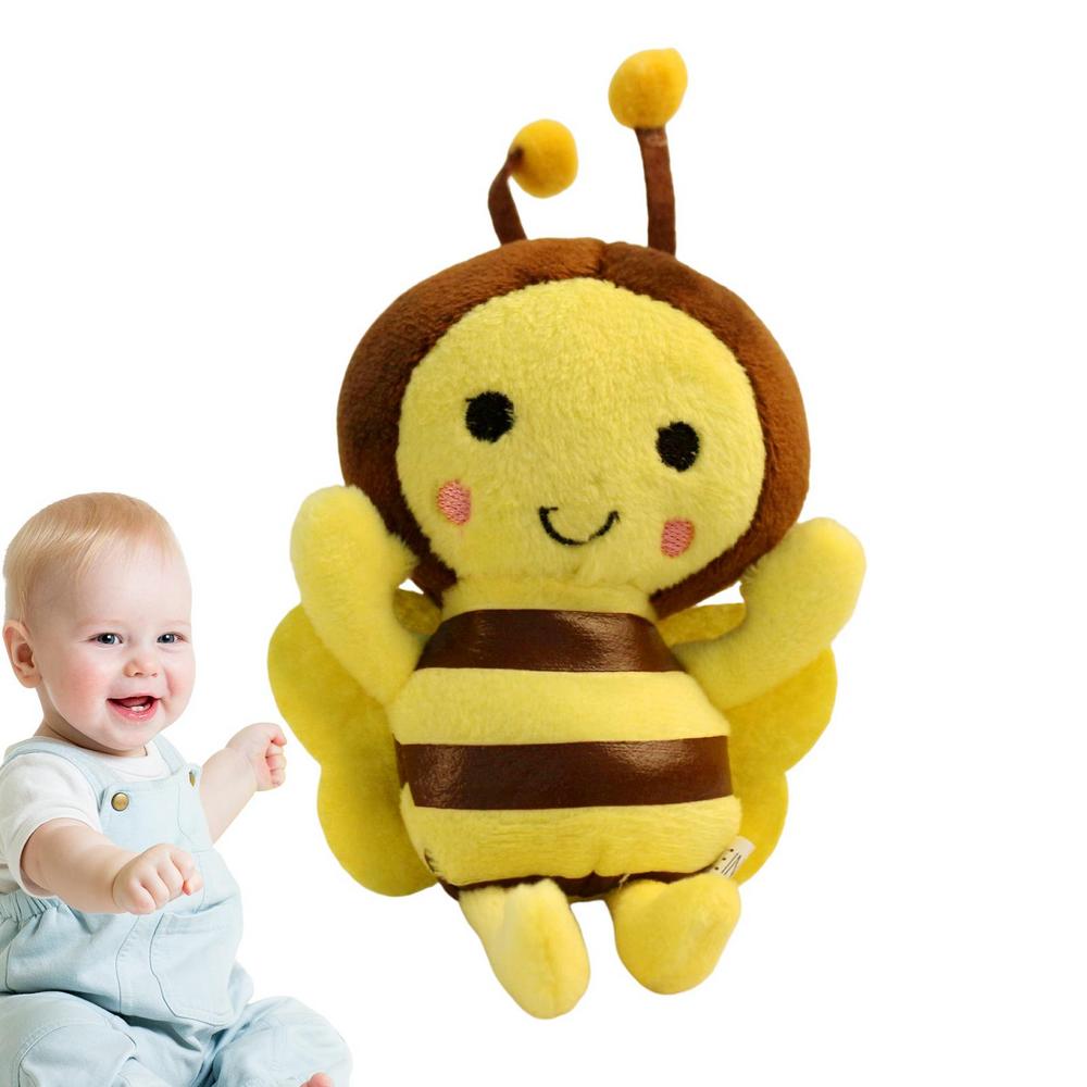 Cute yellow and brown bee stuffed animal made of soft plush fabric with embroidered facial features and fuzzy antennae.