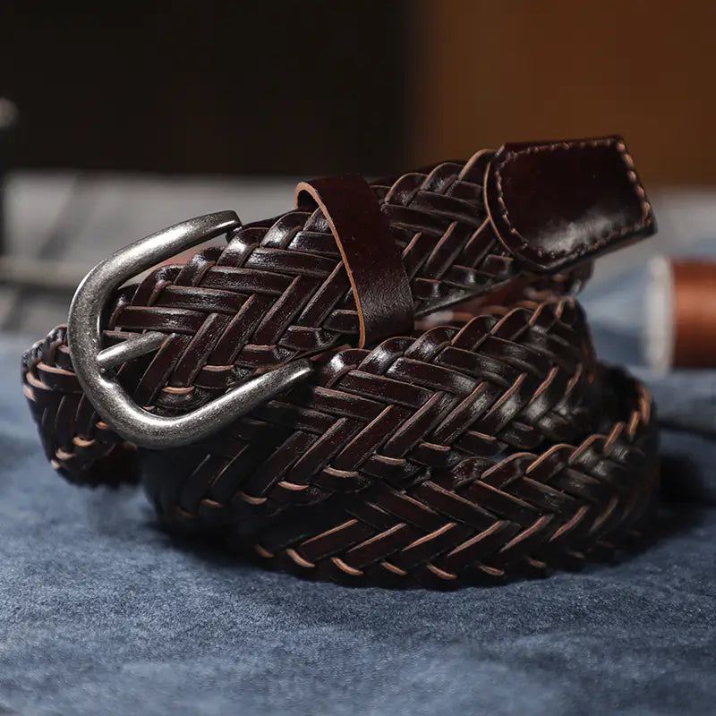dark brown braided leather belt with a silver-toned buckle suitable for unisex casual wear