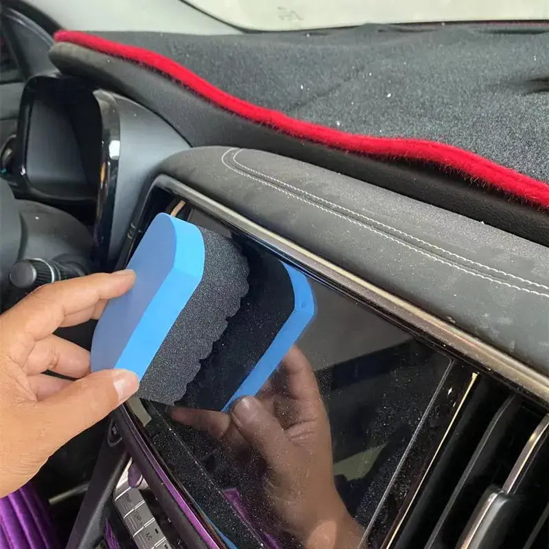 Almohadilla de acabado de esponja para lavado de autos azul y negra de doble cara, diseñada para una limpieza eficiente de ventanas y superficies.