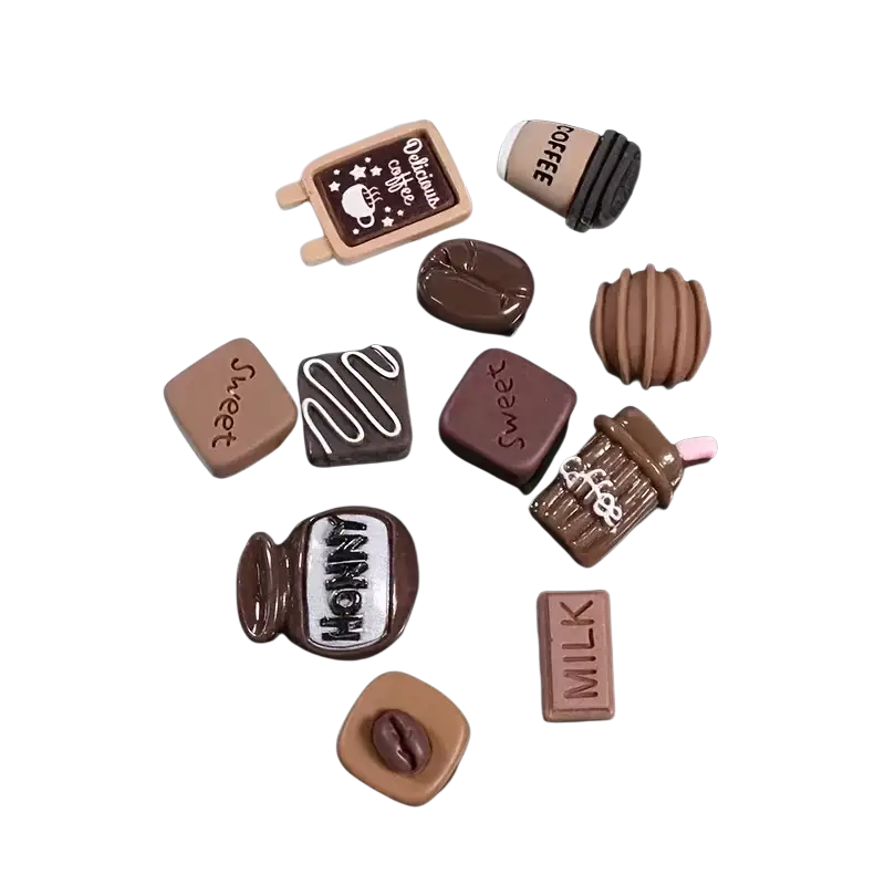 Chocolate-themed resin fridge magnets in assorted shapes and designs for home decor and message board use