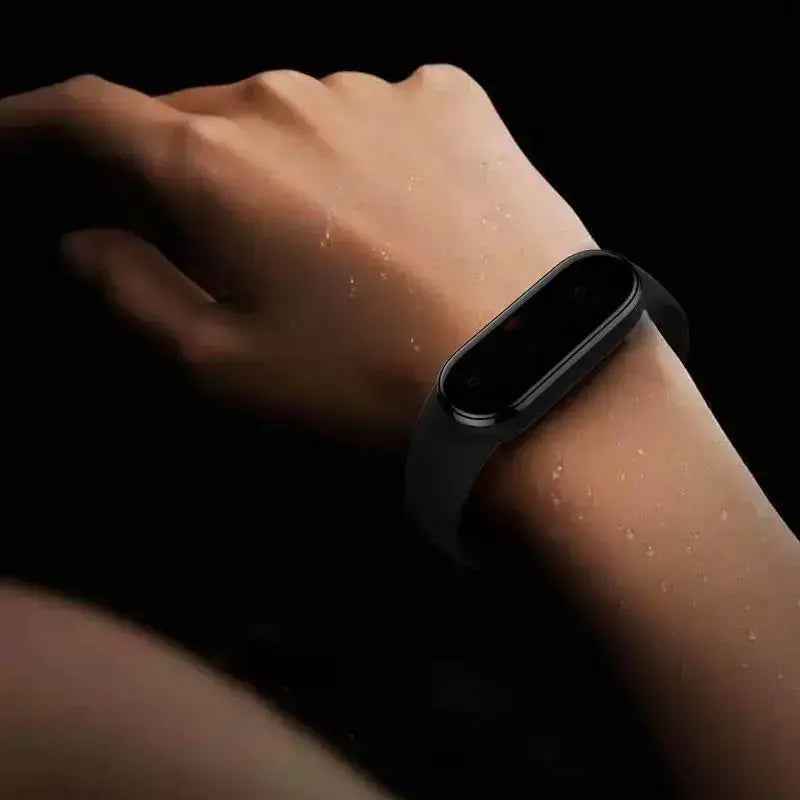 Black xiaomi mi band 5 fitness tracker featuring a sleek minimalist design worn on a wrist with a wristband silicone bracelet for comfortable daily use.