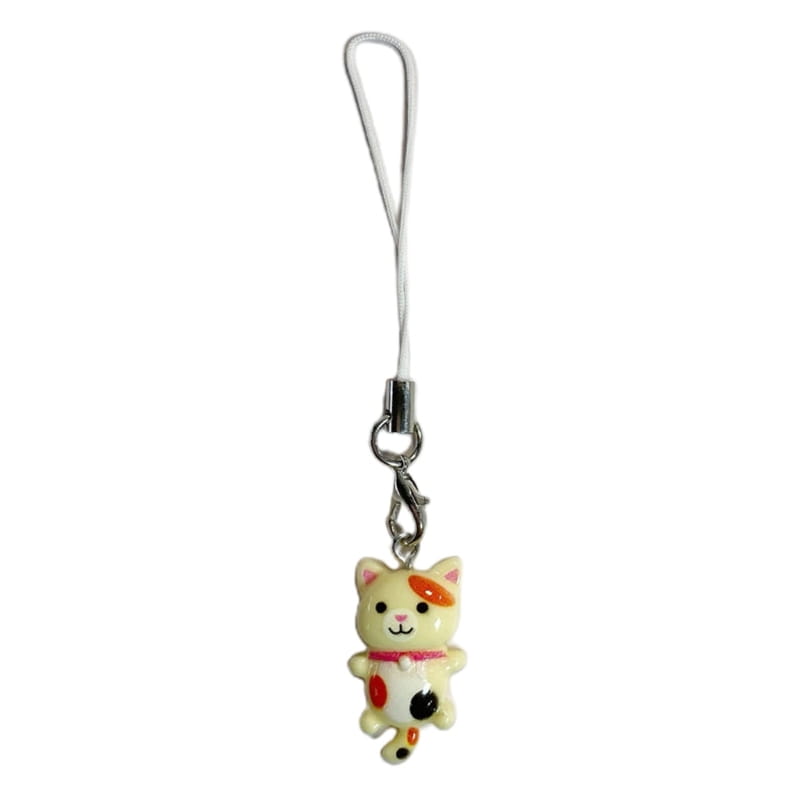 A cute cat phone charm strap featuring a glossy plastic cat charm with orange and black spots on a cream-colored body wearing a red collar.