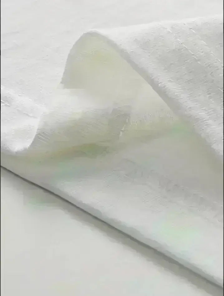 White textured towel with soft absorbent fabric displayed alongside a funny insomnia graphic tshirt dark humor sleep tee.