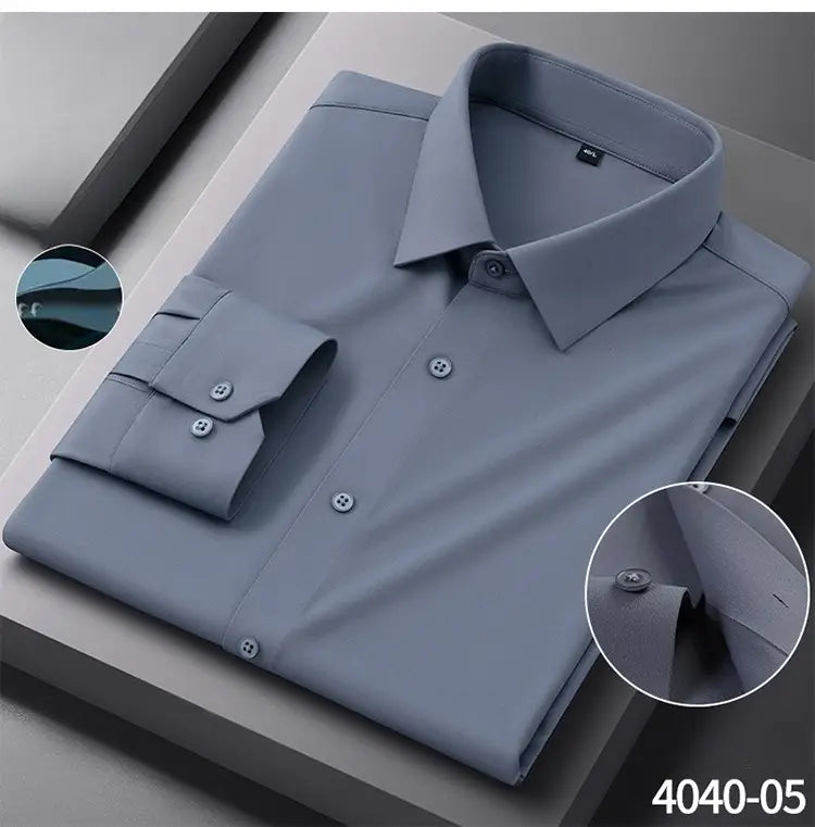 A neatly folded men’s slim fit nylon formal dress shirt in light gray with a classic collar and buttoned cuffs.