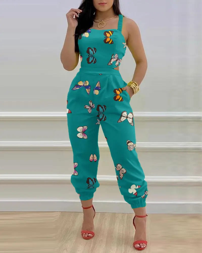Teal butterfly-print women summer jumpsuit featuring cutout sides and cuffed hems.