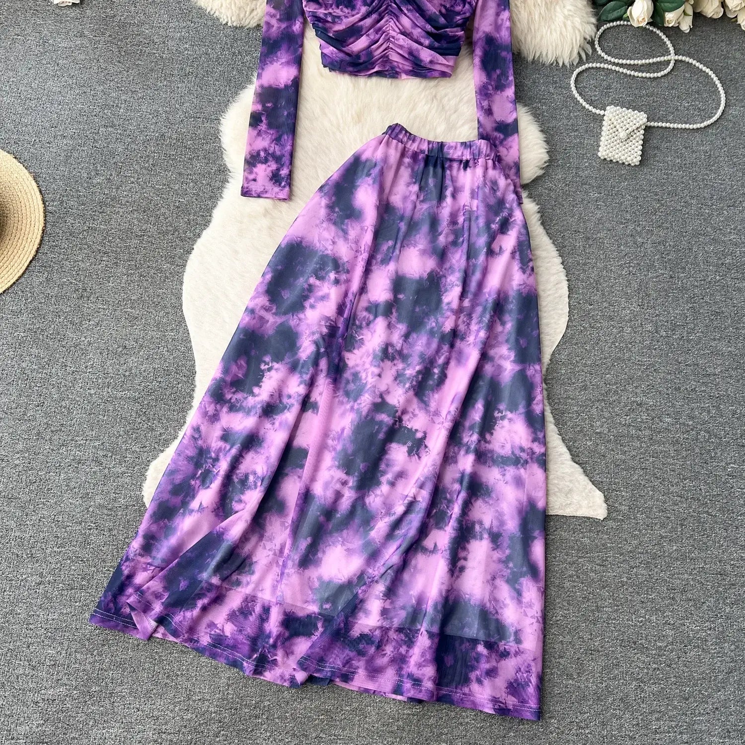 two piece mesh skirt set marble print featuring a purple and black tie-dye long skirt with a ruched top and elastic closure type
