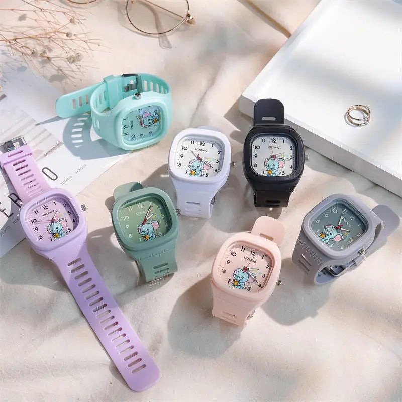 Pastel-colored silicone wristwatches with luminous cartoon mouse faces on square faces designed as kids luminous cartoon elephant digital watch white.