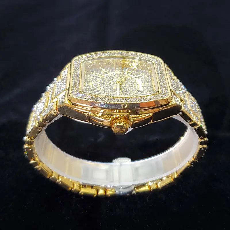 Gold-tone diamond-encrusted square-faced mens watch with a matching bracelet featuring a luxury quartz movement.