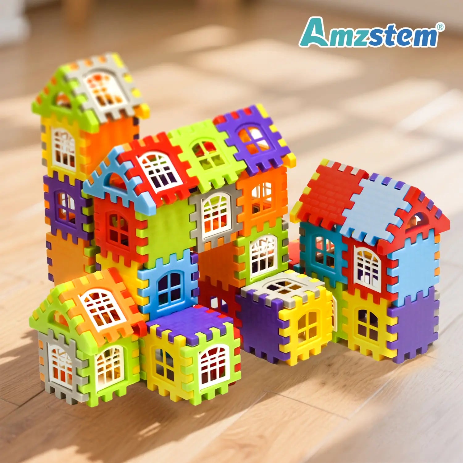 Un conjunto de construcción de casa con grandes bloques de plástico, que presenta bloques de espuma entrelazables de colores en verde, naranja, morado, azul y amarillo, formando una escena de aldea lúdica con recortes detallados de ventanas.