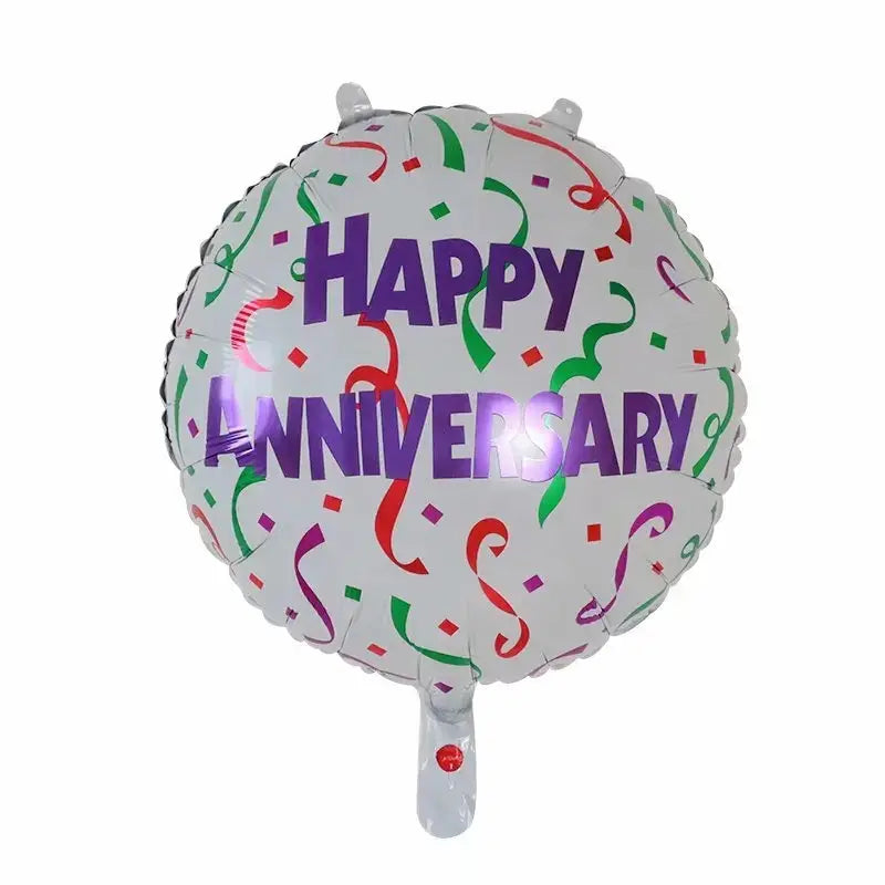 white foil balloon with happy anniversary in purple lettering and colorful confetti patterns from the happy anniversary foil balloons 10 pack