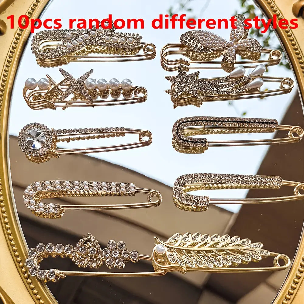 Lot de broches épingle rehaussées de strass ton doré pour femmes, présentant des épingles de sûreté ornées de rhinestones scintillants, de perles, de nœuds, d’étoiles, de fleurs et de plumes, conçues comme pinces à foulard.