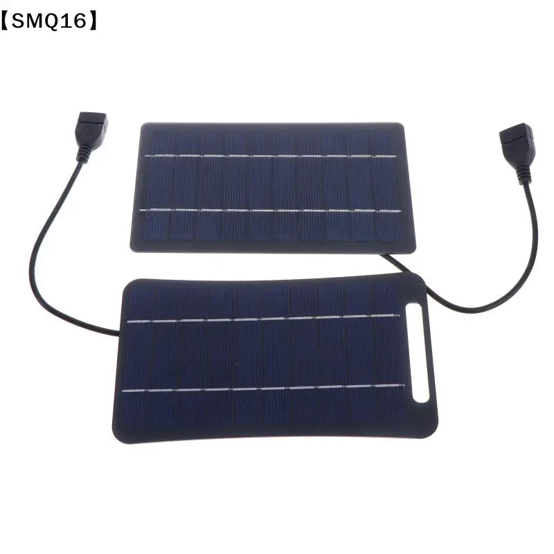 flexible dark blue solar panel portable usb charging panel with black usb cables and connectors designed to stay connected on the go