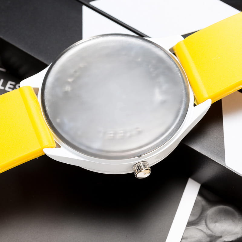 Womage silicone quartz women sports watch featuring a yellow silicone strap, white case, and silver-toned crown.