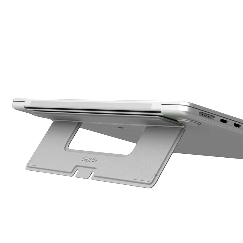 NILLKIN Foldable Multi-Angle Laptop Stand, Adhesive Mount w/Aerospace Hinge, Portable Ergonomic Riser for Posture & Ventilation