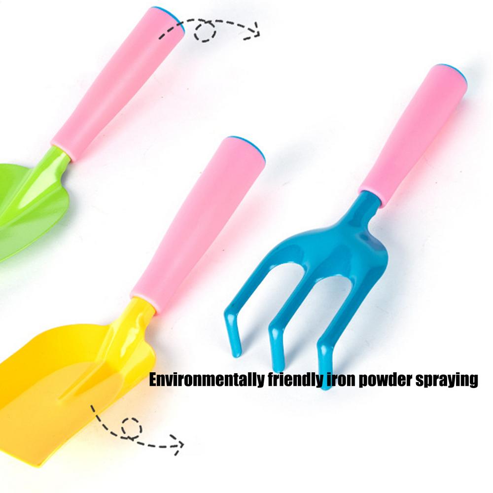 kids gardening set featuring three colorful plastic gardening tools with pink handles and heads in green yellow and blue for outdoor use