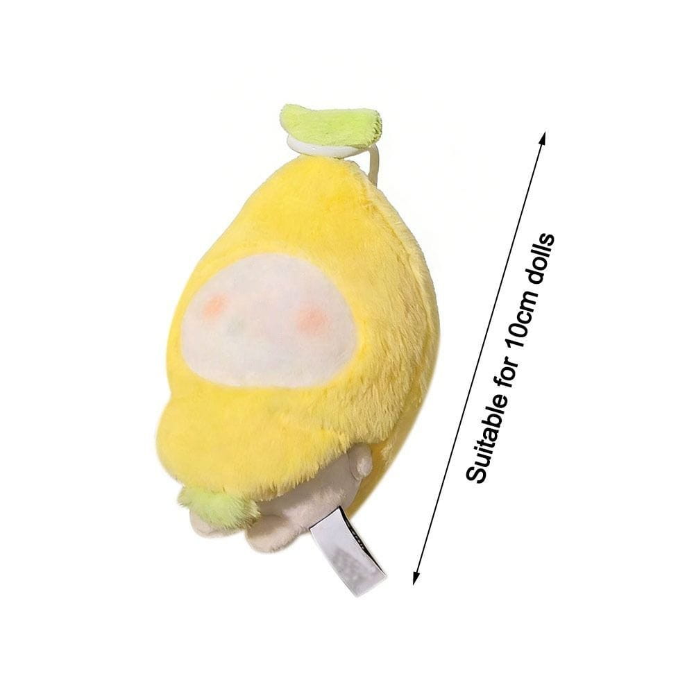 A soft yellow plush doll shaped like a lemon with a white face and light green stem designed as animal costume headgear measuring 10cm.