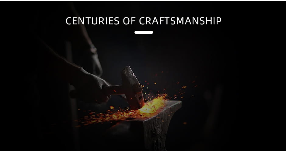 a glowing orange-hot piece of metal being hammered on a dark anvil illustrating the forging process of stainless steel for a chef knife set