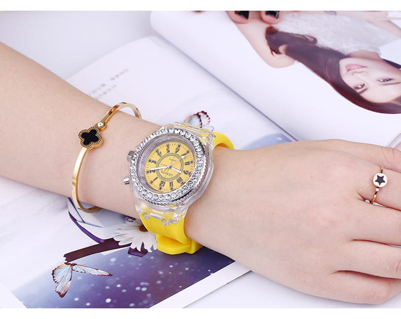 Yellow silicone led luminous watch featuring a clear crystal bezel encrusted with rhinestones and a yellow dial digital timepiece.